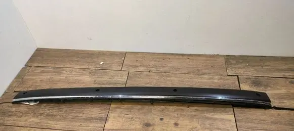Rear bumper trim bar molding