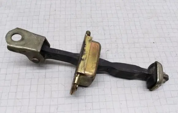 Nissan Almera Tino Front door check strap stopper