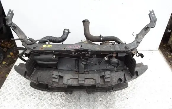 Radiator support slam panel