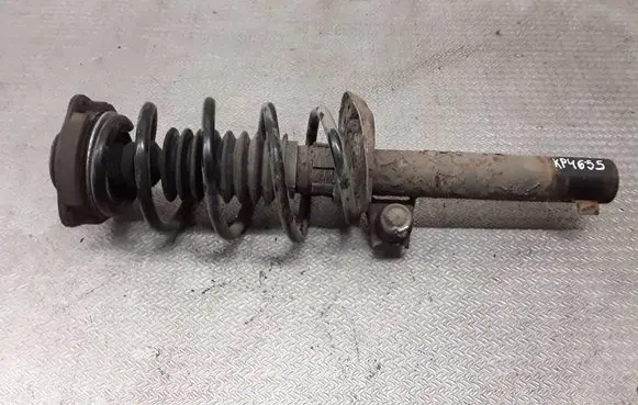 Volkswagen Golf V Front shock absorber with coil spring