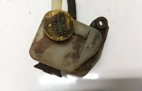 Mazda 323 Power steering fluid tank/reservoir 