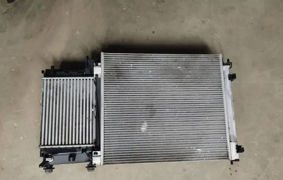 Radiator support slam panel