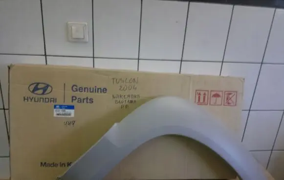 Hyundai Tucson JM Front arch trim 877142E000