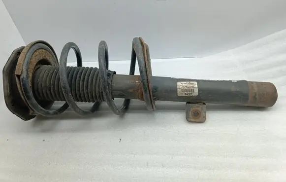 Citroen Berlingo Front shock absorber with coil spring
