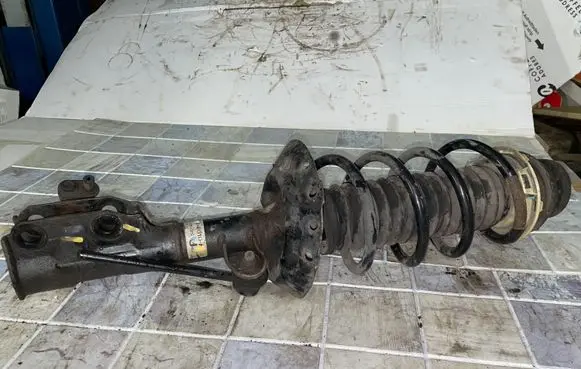 Honda Jazz Front shock absorber with coil spring