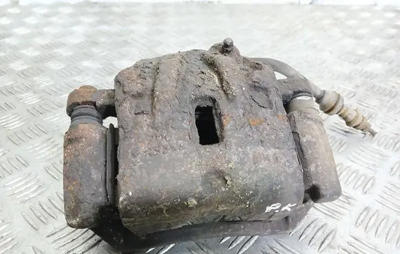 KIA Carens I Front brake caliper