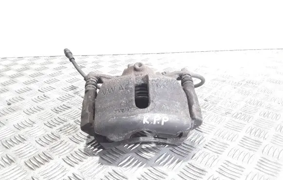 Volkswagen Golf VII Front brake caliper