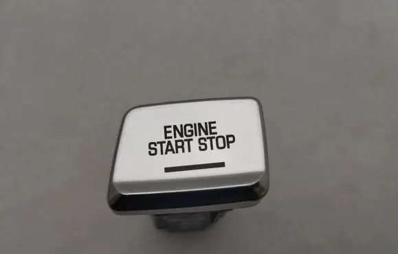 Engine start stop button switch