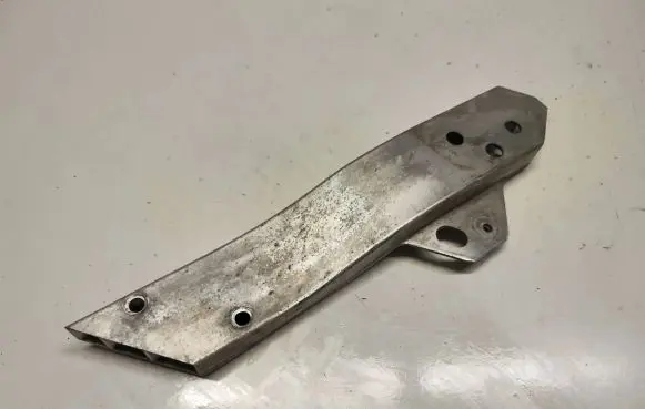 Radiator support slam panel bracket