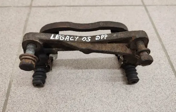 Subaru Legacy Front Brake Caliper Pad/Carrier 