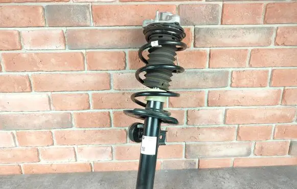 Front shock absorber with coil spring