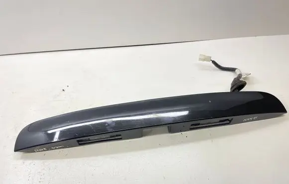 Trunk door license plate light bar