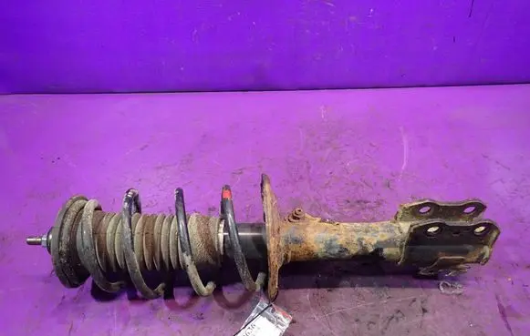 Toyota Yaris Front shock absorber with coil spring 