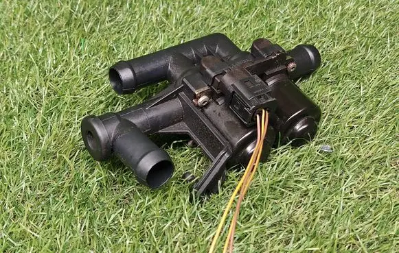 Coolant heater control valve
