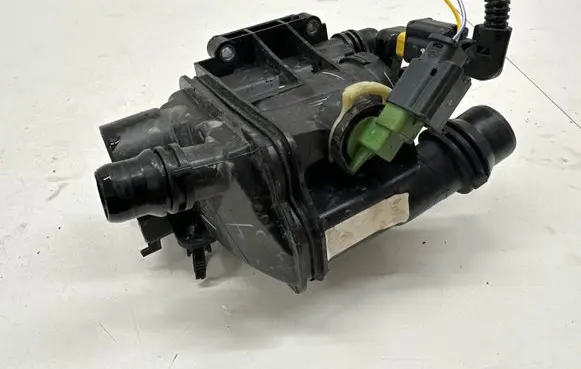 Thermostat/thermostat housing