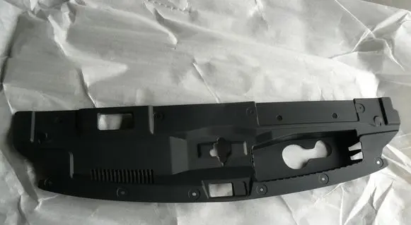Engine bonnet/hood lock trim molding