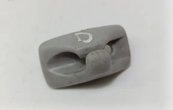 Volkswagen Golf III Sun visor clip/hook/bracket 1H0857559