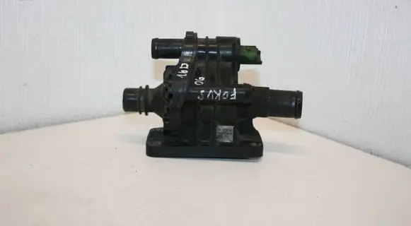 Thermostat/thermostat housing