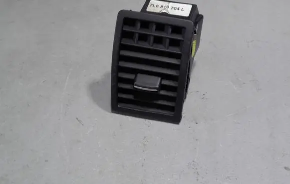 Volkswagen Touareg I Dash center air vent grill 7L6819704L