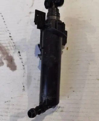Headlight washer spray nozzle