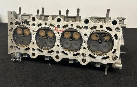 Suzuki Grand Vitara I Engine head V6KI0A067