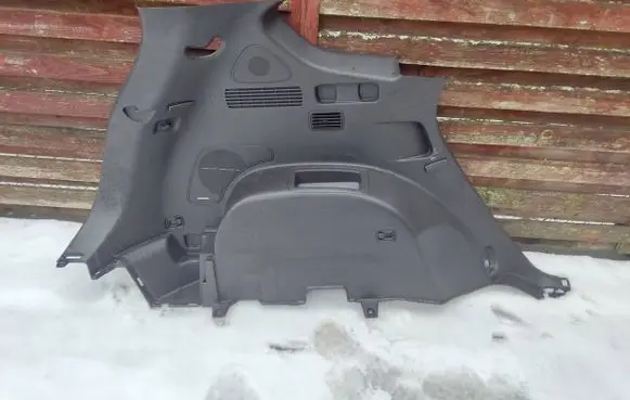 Trunk/boot lower side trim panel