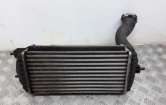 KIA Carens III Intercooler radiator 282702A820