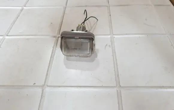 Mazda 6 Number plate light 13061971
