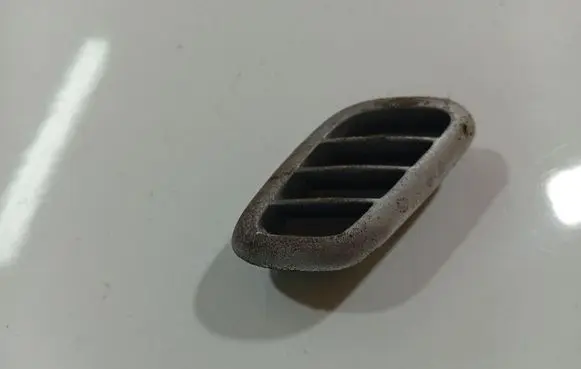 Dash center air vent grill