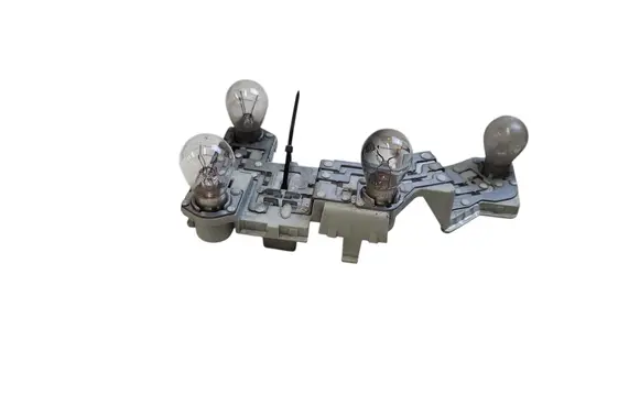 Volvo V50 Tail light bulb cover holder