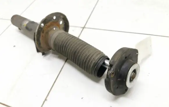 Skoda Octavia Mk2 (1Z) Front shock absorber with coil spring