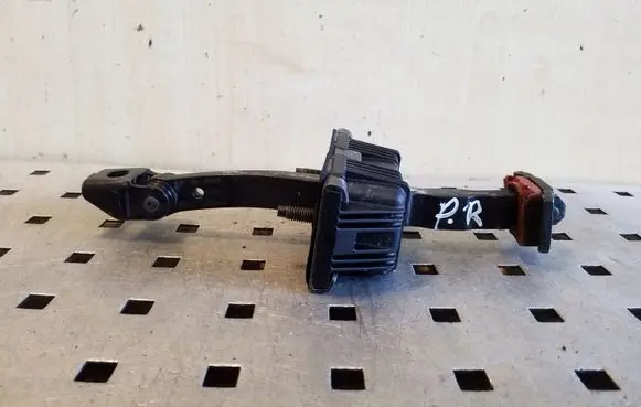 Front door check strap stopper