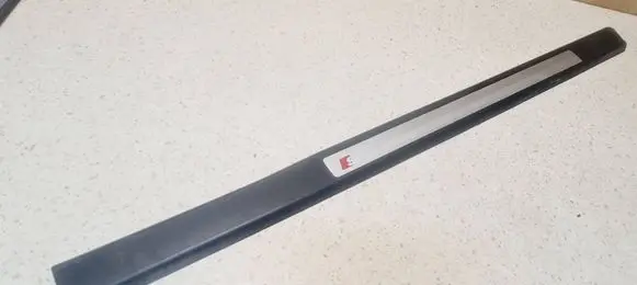 Front sill trim cover
