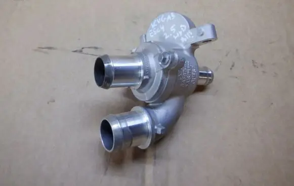 Thermostat/thermostat housing