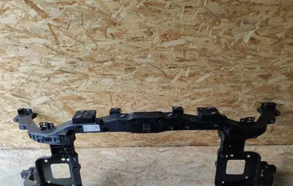 Radiator support slam panel