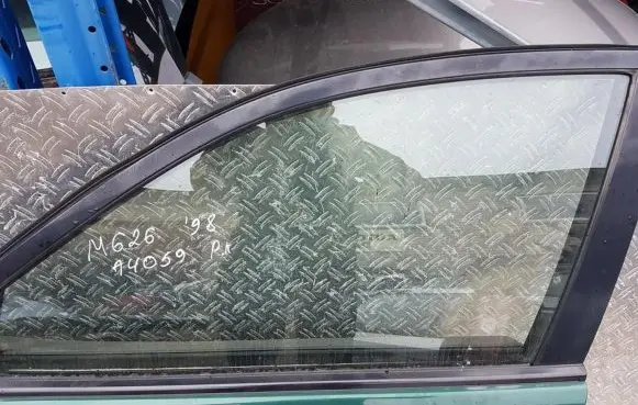 Mazda 626 Front door window glass four-door