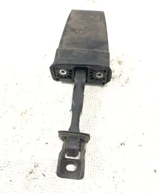 Front door check strap stopper