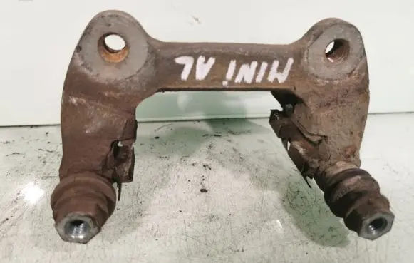 Mini One - Cooper Coupe R56 Brake caliper pad carrier rear 