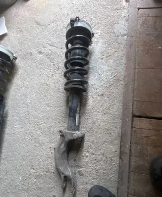Front shock absorber with coil spring
