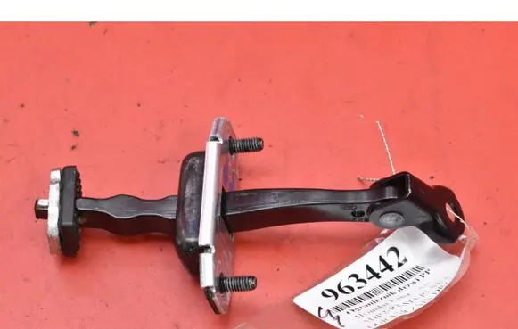 Front door check strap stopper
