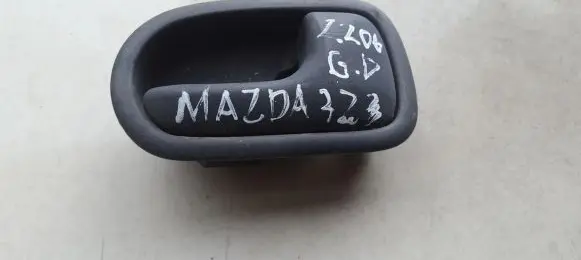 Mazda 323 Rear door interior handle