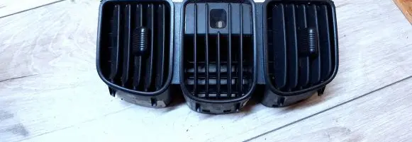 Chrysler Grand Voyager IV Dash center air vent grill P12221076A