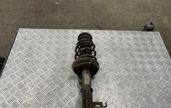 Opel Astra J Front shock absorber/damper 13354010