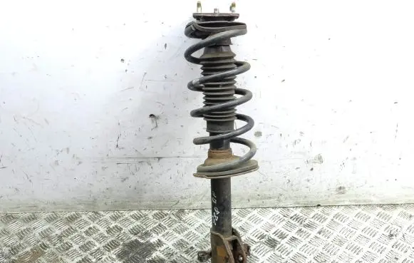 Mazda CX-7 Front shock absorber/damper EH6434700A