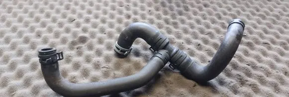 Volkswagen PASSAT B6 Engine coolant pipe/hose 1K0122063K