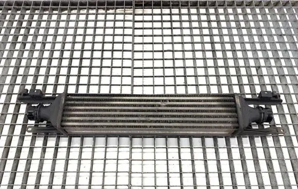 Opel Corsa D Intercooler radiator 440926702