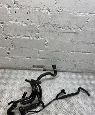 Volkswagen Golf VII Engine coolant pipe/hose 04L121064