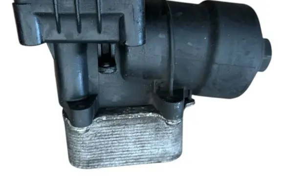 Volkswagen Polo V 6R Oil filter mounting bracket 03L117021C