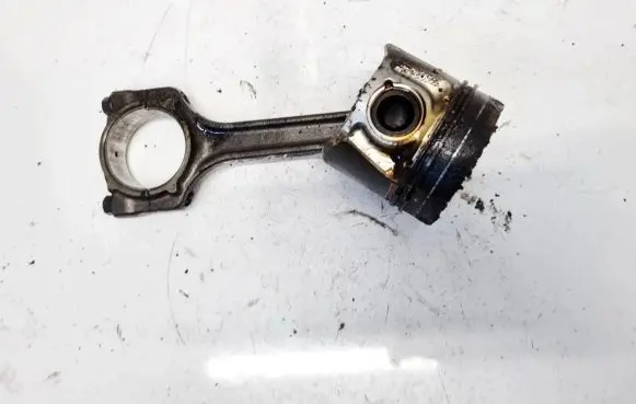 Piston with connecting rod
