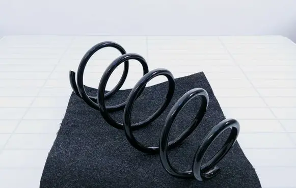 Volkswagen Golf II Rear coil spring 175634070916 191511115A 1756340